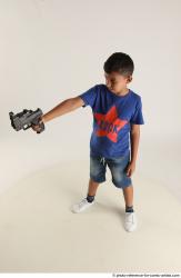 TIMBO STANDING POSE WITH GUN